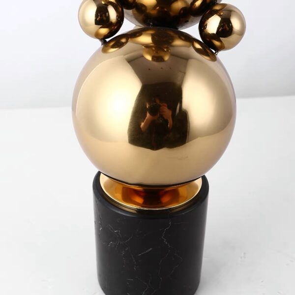 Steel ball sculpture plated in gold on marble - Image 2